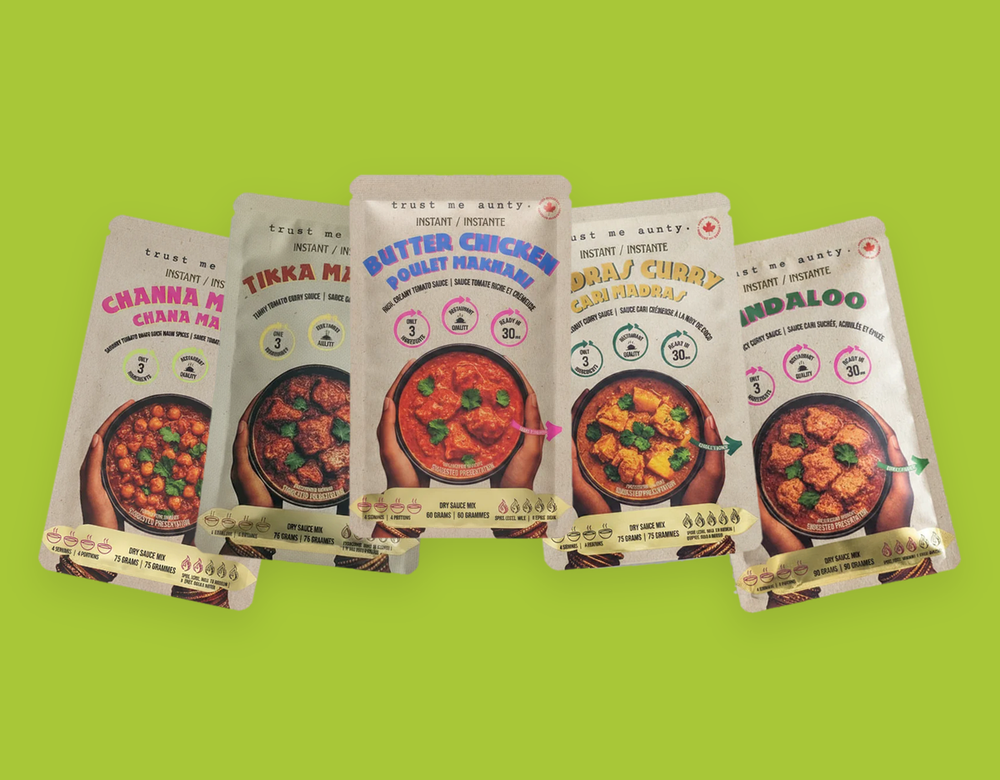 All five Trust Me Aunty curry mix pouches: channa masala, tikka masala, butter chicken, madras curry and vindaloo