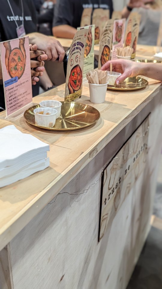 The market stand set up with tasting plates